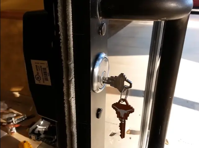 Locksmith installing a new lock on a home in Lacy-Lakeview, TX