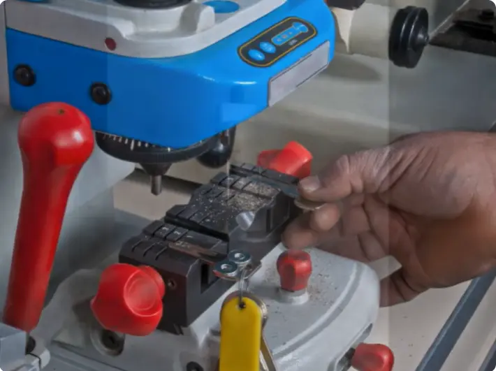 Locksmith repairing a door key in Hewitt, TX